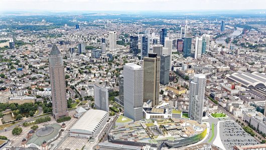 Rendering of the new 190m high office and hotel tower ONE (centre, light grey) in the Frankfurt banking quarter.