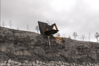 Modernes Haus mit dreieckigen Fenstern über einer Felsklippe