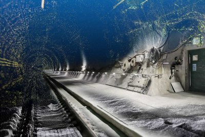 Blick in einen Tunnel, überlagert mit digitalen Punktwolken