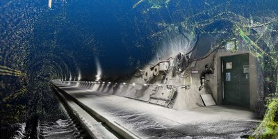 Blick in einen Tunnel, überlagert mit digitalen Punktwolken