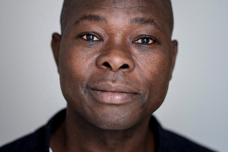 A portrait of Francis Kéré, a well-known architect from Burkina Faso.