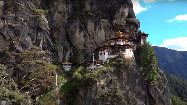 Buddhist monastery complex in rock walls